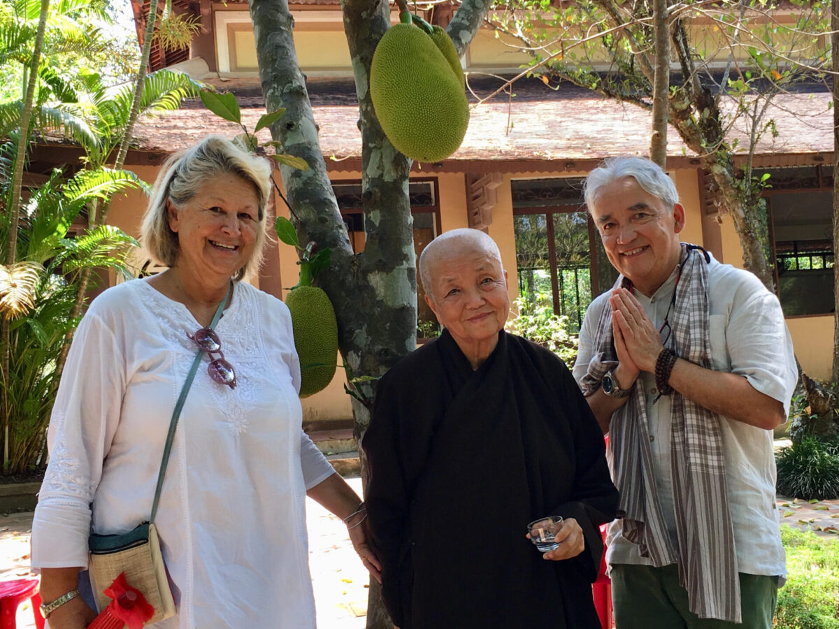 Author Tho Ha Vinh with his wife, Lisi, and Sister Chan Khong in Vietnam.